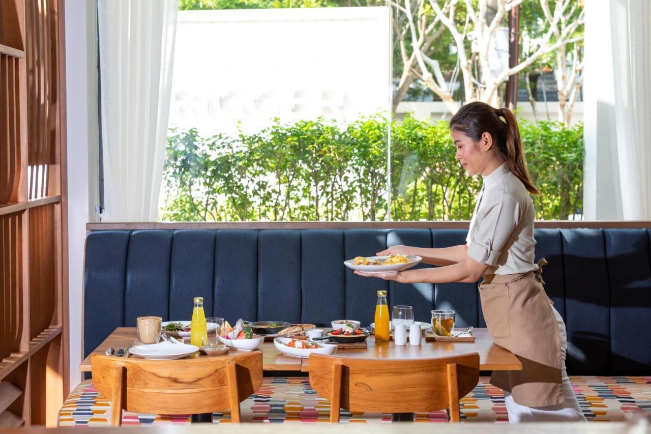 Outrigger Surin Beach Resort - Sha Extra Plus Екстериор снимка A Thai waitress serving food