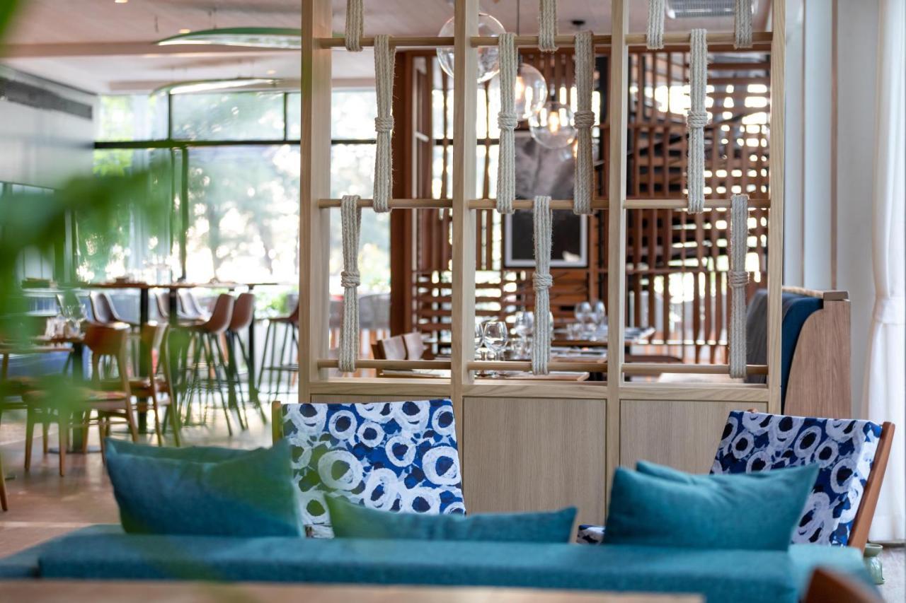 Outrigger Surin Beach Resort - Sha Extra Plus Екстериор снимка The restaurant