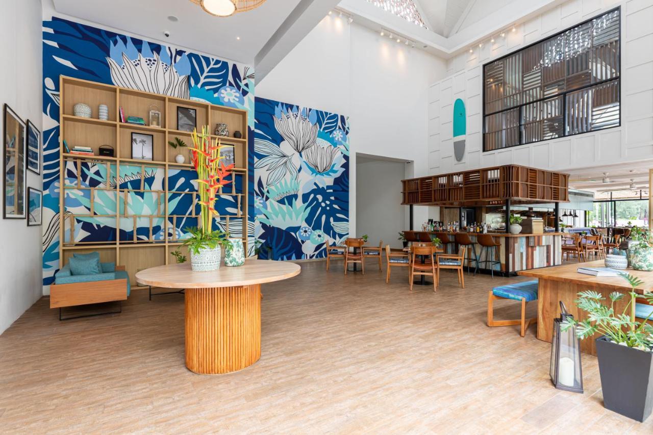 Outrigger Surin Beach Resort - Sha Extra Plus Екстериор снимка The interior of the library