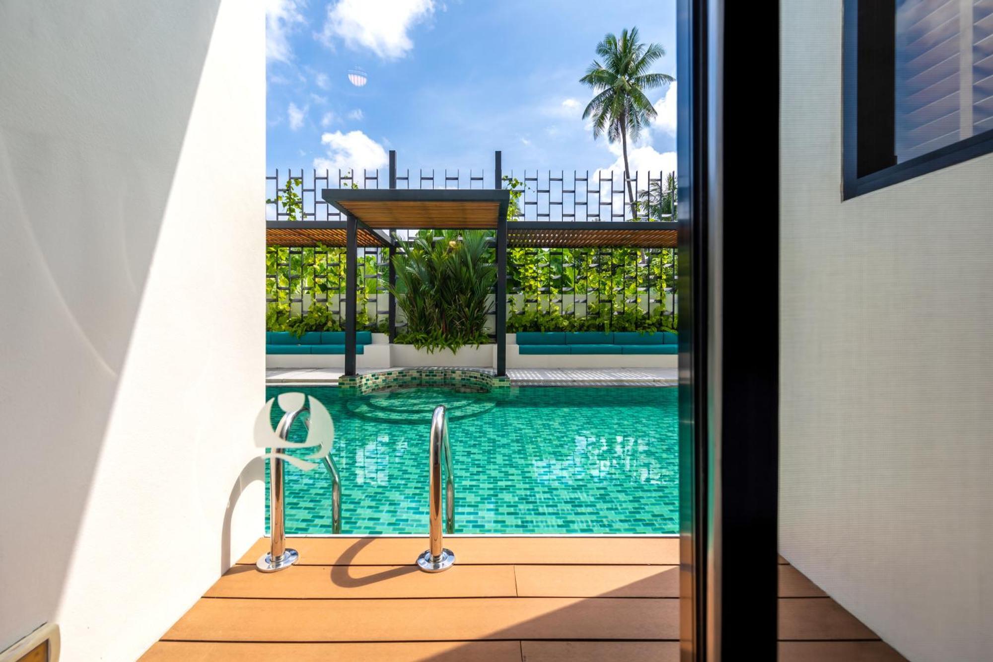 Outrigger Surin Beach Resort - Sha Extra Plus Стая снимка The swimming pool at the hotel