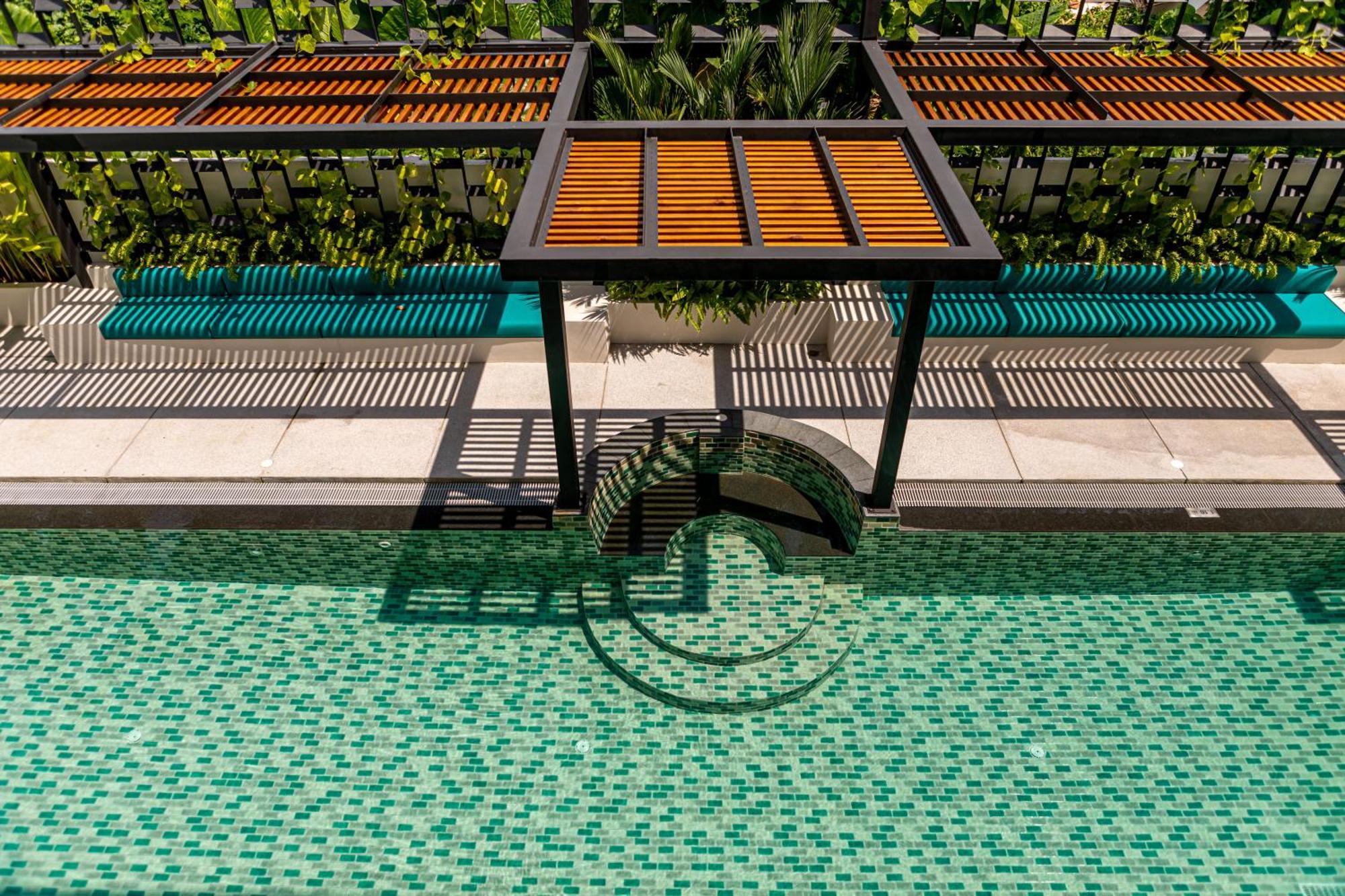 Outrigger Surin Beach Resort - Sha Extra Plus Стая снимка The swimming pool at the hotel